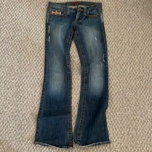 Plastic by Gly. Distressed jeans. Size 7
